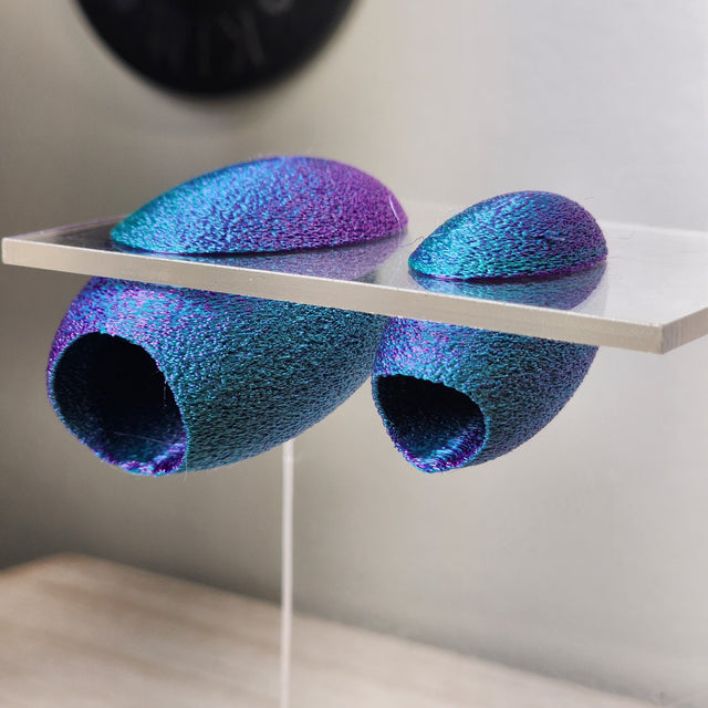 Fuzzy Cocoon Jumping Spider Hides in 2 sizes and several colors.