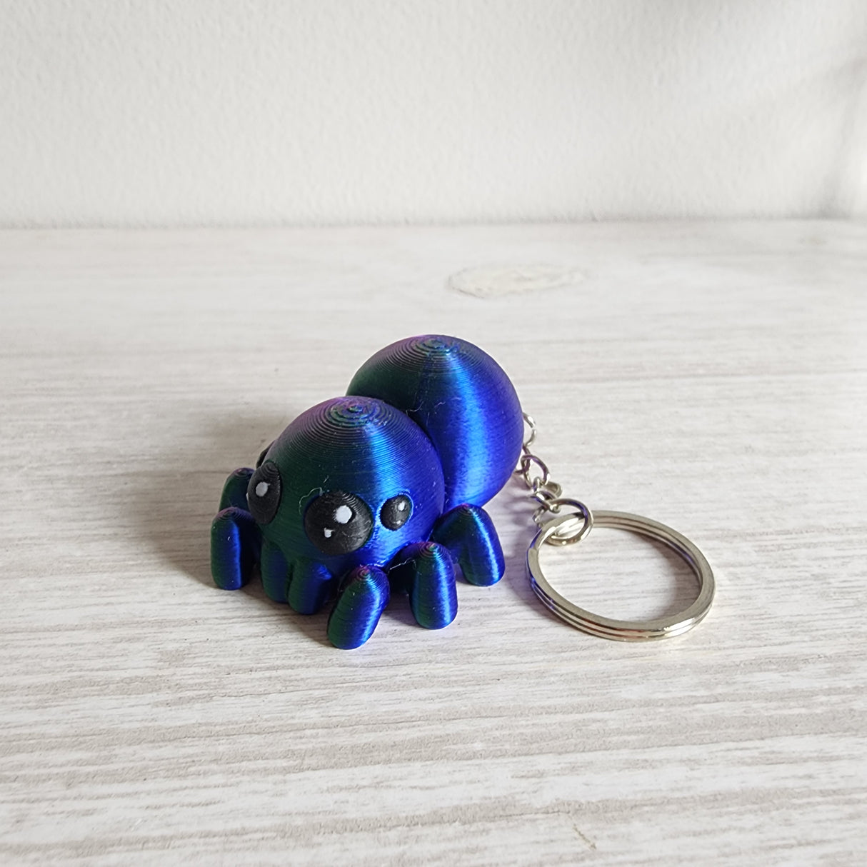 Pocket Jumper Keychain Iridescent Blue